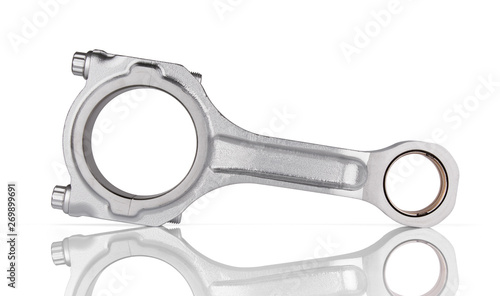 Connecting rod from a car engine isolated on white