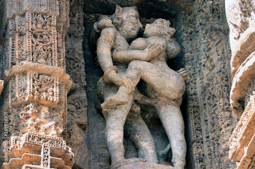 Konark Sun Temple in Odisha, India. Erotism and origin of kamasutra in Indian sculpture. Erotic sculpture of Konark temple.