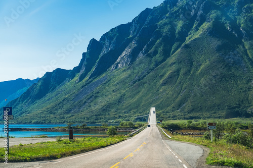 Roads and natural landscape in the heart of Lofoten. Gimsoystraumbrua bridge is one of many bridges that connect the islands of Lofoten to each other as part of the European route E10 highway