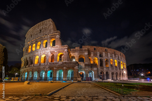 Colosseum architectural structure at night, in Rome.