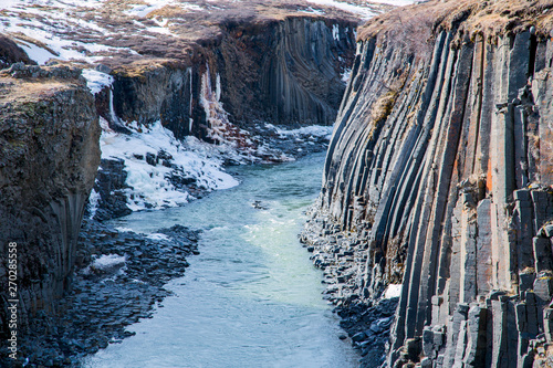 Basalt column formation in a canyon in winter
