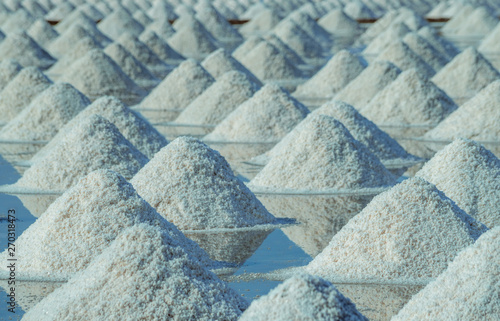 Sea salt farm in Thailand. Organic sea salt. Evaporation and crystallization of sea water. Raw material of salt industrial. Sodium Chloride. Solar evaporation system. Iodine source. Closeup salt pile