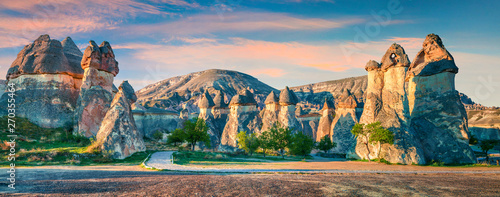 Colorful spring panorama of fungous forms of sandstone in the canyon near Cavusin village, Cappadocia, Nevsehir Province in the Central Anatolia Region of Turkey, Asia. 