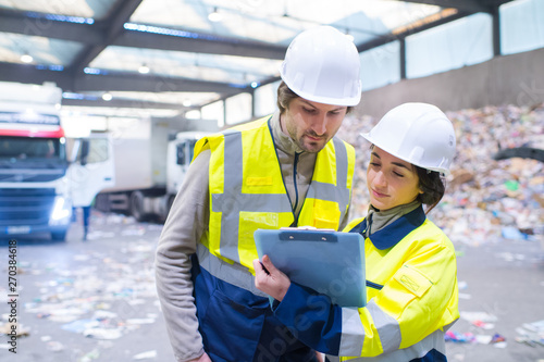 workers at recycling plant