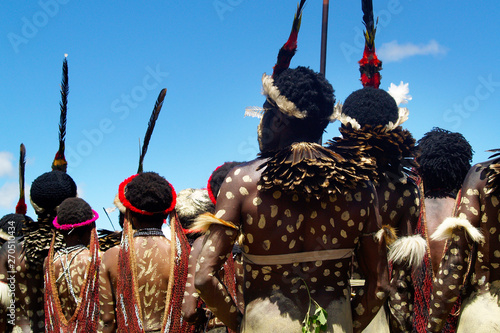 dani people during tribe festival in wamena-baliem valley-papuasia-indonesia