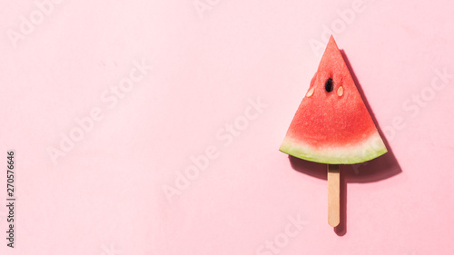 watermelon popsicle. Water melon slice on pink background. Top view or flat lay. Summer, healthy diet, vegetarian vegan concept. Copy space for text. Banner
