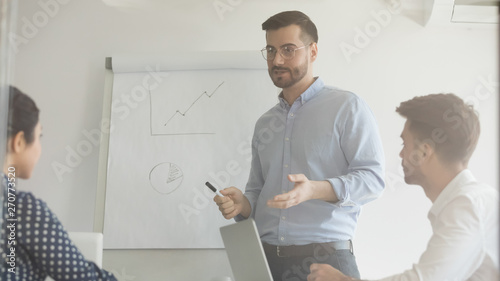Male speaker talk making whiteboard office presentation