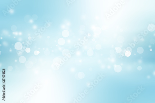 white bokeh blur background / Circle light on blue background / abstract light background