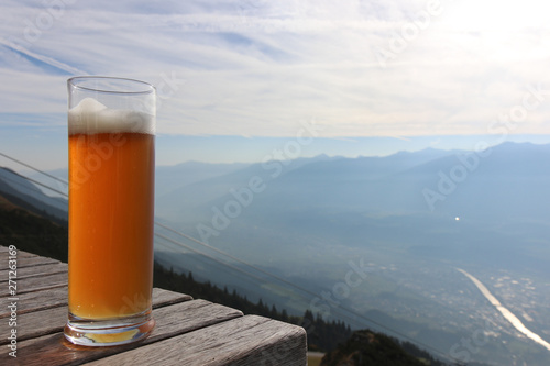 Beer on mountain view. table