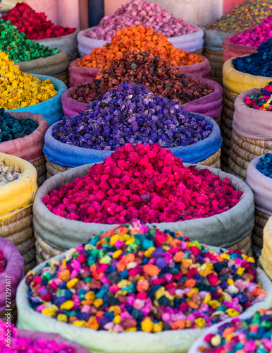 Multicolored dried flowers on sale in the souks of Marrakesh's medina in Morocco