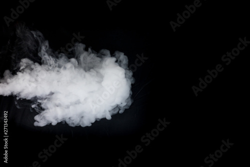 White vape smoke isolated on black background