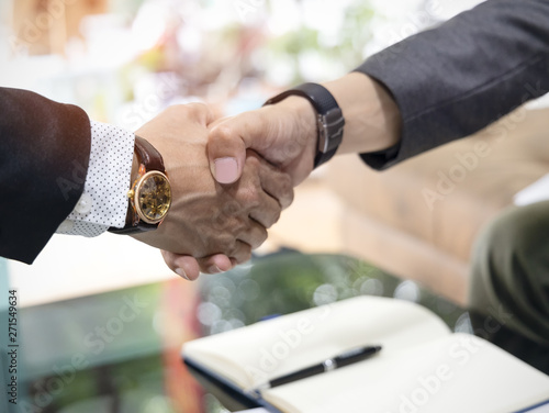 Handshake of Customer businessman for Help, trust ,support ,empathy and factors relationship marketing for reach successful achievement and meeting commit concept in the office