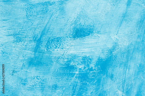 Abstract blue paint on a surface, texture art background