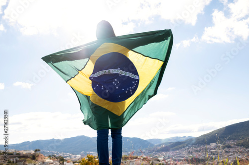 Woman with brazilian flag, independence day