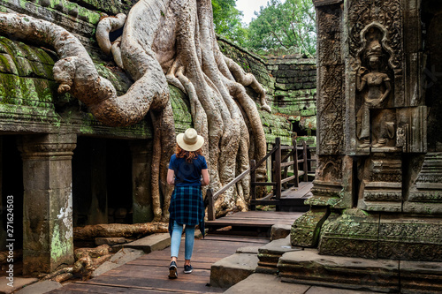 Siem Reap, Cambodia, Traveler Exploring Ta Prohm Temple at Angkor