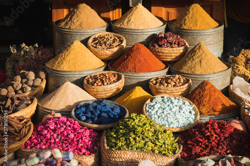 Colorful spices at a traditional market in Marrakech, Morocco