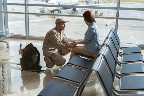 Soldier situating opposite his spouse and promising to come back home alive