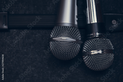 Two dual microphone for vocalists duet of singers concept.