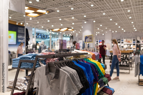 Minsk, Belarus - May 29, 2019: interior shot of racks with shirts and undershirts