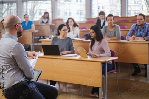 Multinational group of students in an auditorium