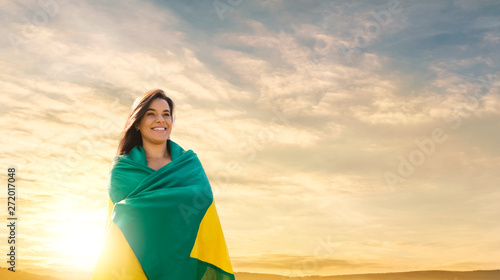 Woman with brazilian flag, brazilian fan