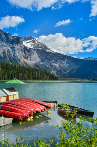Canoes on a dock at the Beautiful Emerald lake in Yoho National Park, Banff Canada