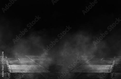 Empty background scene. Dark street reflection on the wet pavement. Rays neon light in the dark, neon figures, smoke. Night view of the street, the city. Abstract dark background.