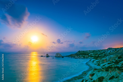 Republic of Cyprus. Aphrodite rock at sunset, vast panorama. Sunset on the Aphrodite bay shore. Petra tou Romiou. Kouklia coast. Mediterranean island of Cyprus. Seascape. Paphos. Landscapes of Cyprus.