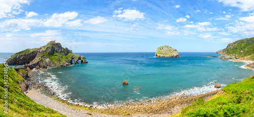 sunny day at gaztelugatxe island, located at basque country coastline