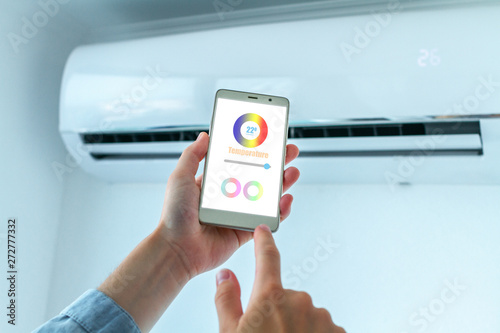 Mobile application on smartphone for adjusting the temperature on the air conditioner. Smart House