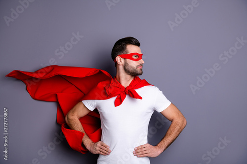 Portrait of his he nice-looking attractive content macho candid virile bearded guy looking aside ready to rescue isolated over gray pastel background