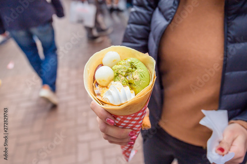 crepe with matcha green tea ice cream, red bean paste, mochi, chestnuts, and whipped cream from the Marion Crepes shop at Harajuku, Japan.