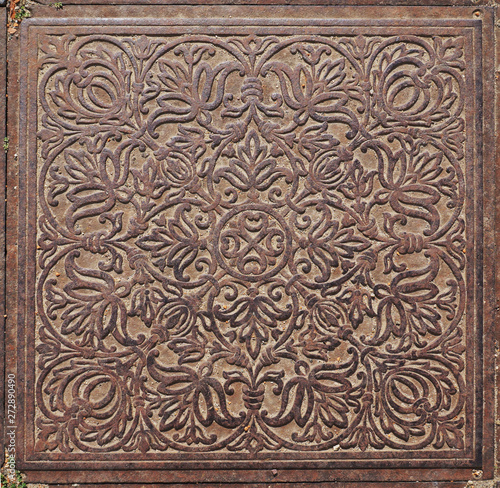Texture of an ancient ornament on iron plate