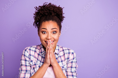 Close up photo of content funny funky millennial make religion gesture spiritual plead want wait expect inspired candid she wear plaid outfit top-knot isolated on purple background