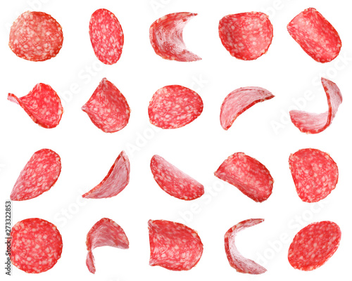 Set of flying cut fresh sausage on white background