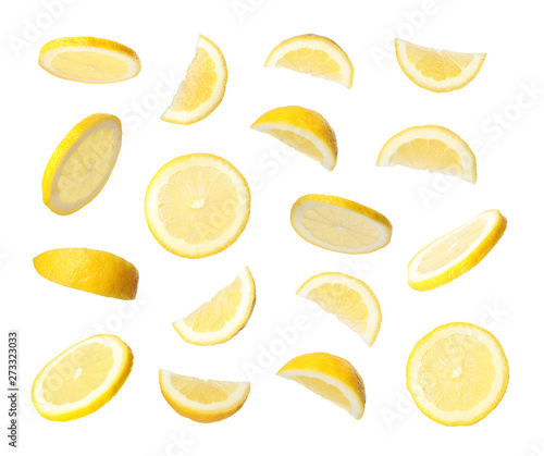 Set of flying cut fresh juicy lemon on white background