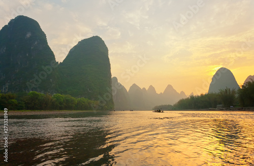 Unusual natural landscape with green karst hills and the Li River (Lijiang River). The place that is depicted on the bill is 20 yuan. Beautiful Chinese nature park. Travels in China
