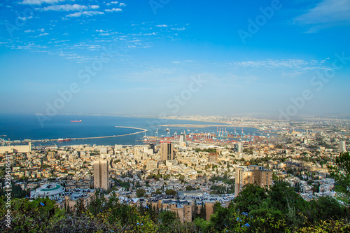 Panoramic view of the harbor port of Haifa, with downtown Haifa, the harbor, the industrial zone in a sunny summer day. Haifa, Northern Israel