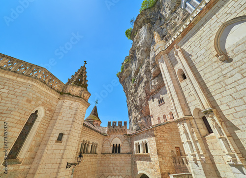 View of the main square atrium of Saint Sauveur and Blessed Virgin Mary sanctuary and chapels in the medieval french village of Rocamadour, Lot, Quercy, France. UNESCO world heritage site.