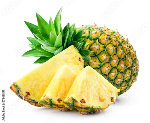 Whole pineapple and pineapple slice. Pineapple with leaves isolate on white. Full depth of field..