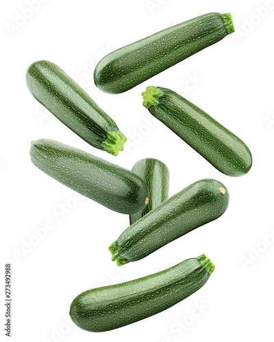 Falling zucchini isolated on white background, clipping path, full depth of field