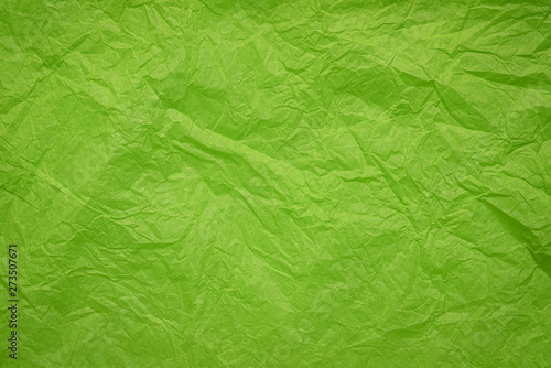 crumpled and wrinled green paper