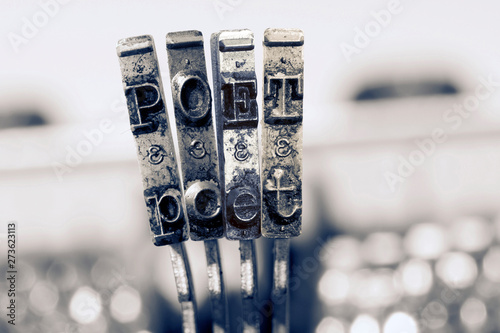 The word POET with old typewriter