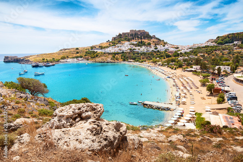 Idyllic Paradise landscape of the resort town of Lindos on the island of Rhodes, Greece. The concept of holidays in the tropics and historical cities