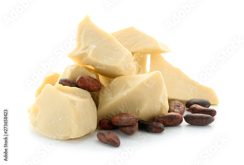 Pieces of cocoa butter on white background