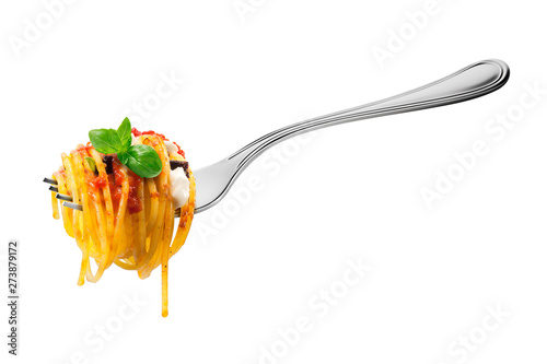 Fork with spaghetti pasta mozzarella aubergine tomatoes and basil