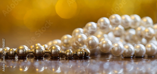 Beautiful shiny white and golden pearls, necklace jewelry web banner
