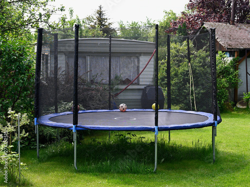 Large trampoline built in the garden.