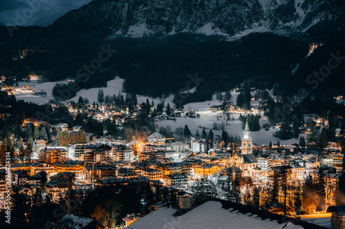 Scenic night view over Cortina d'Ampezzo in winter. Cortina d'Ampezzo is located in Dolomites, Italy.