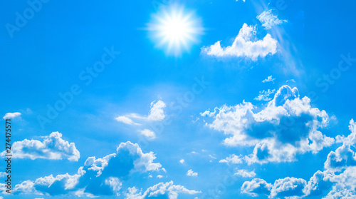 Beautiful blue sky with white clouds and sunlight